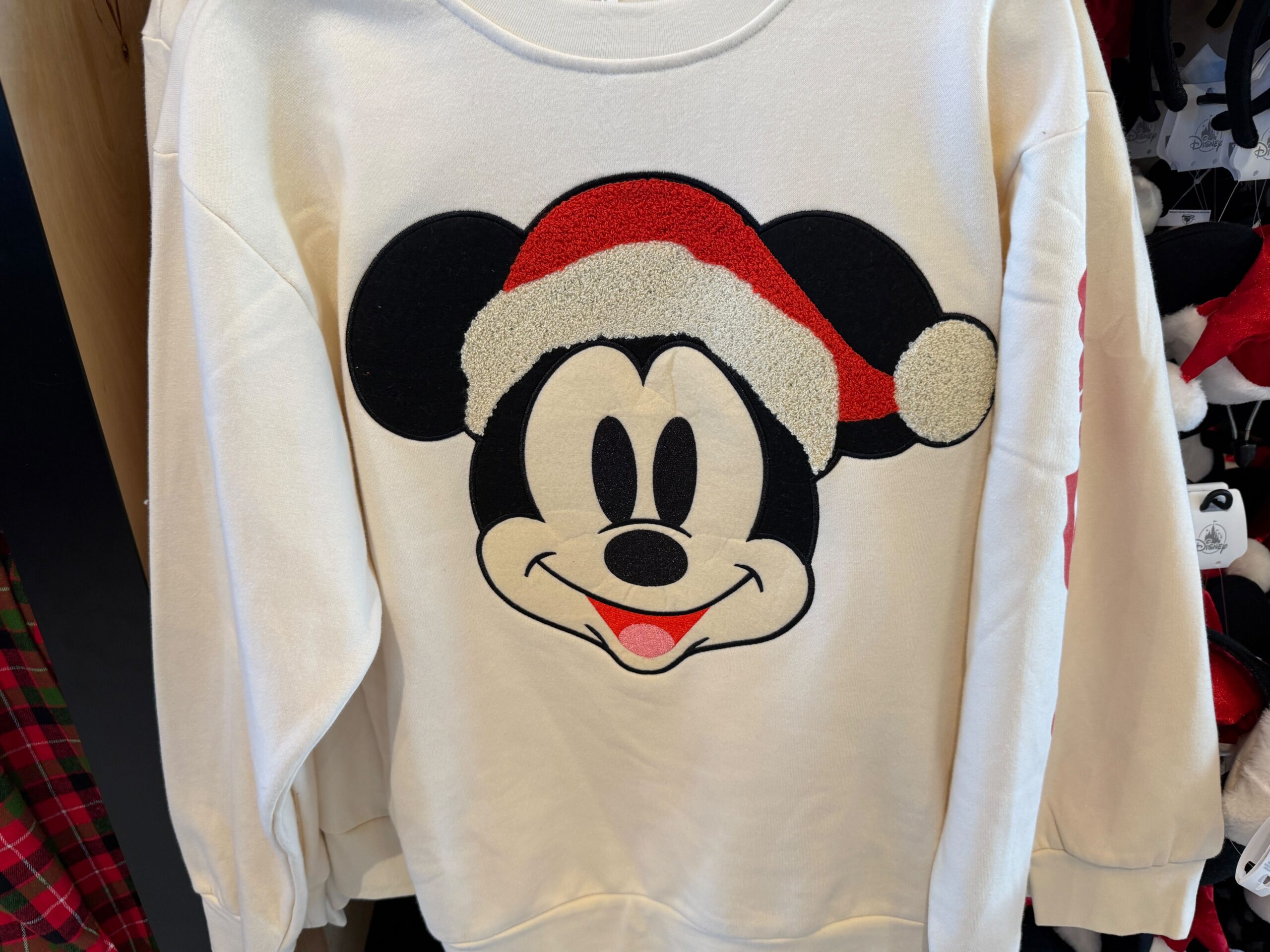 Get in the Holiday Spirit with NEW Mickey Santa Pullover Sweatshirt Post Image
