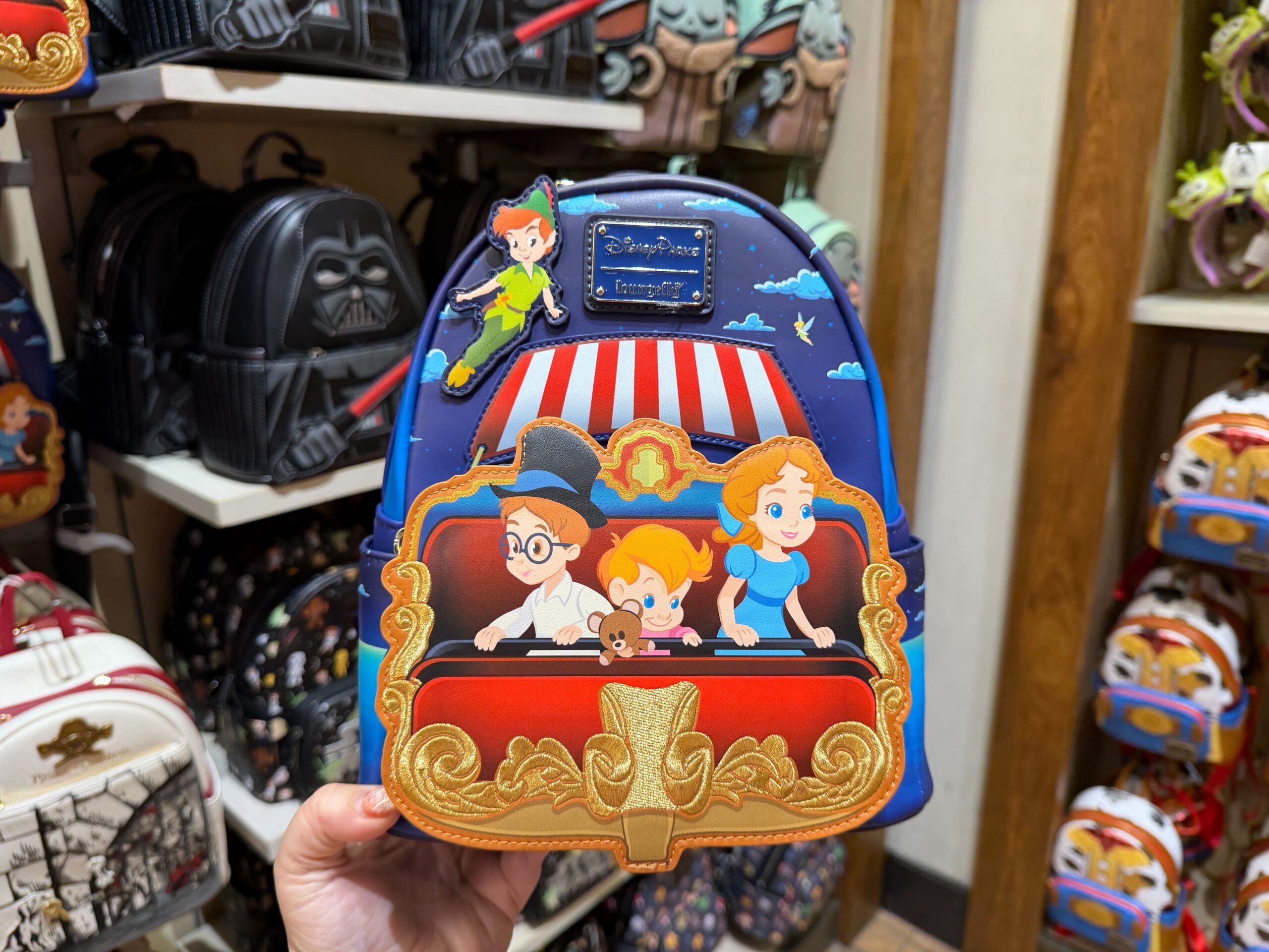 NEW Peter Pan’s Flight Loungefly Backpack Has Just Sailed Into Disney Springs Post Image